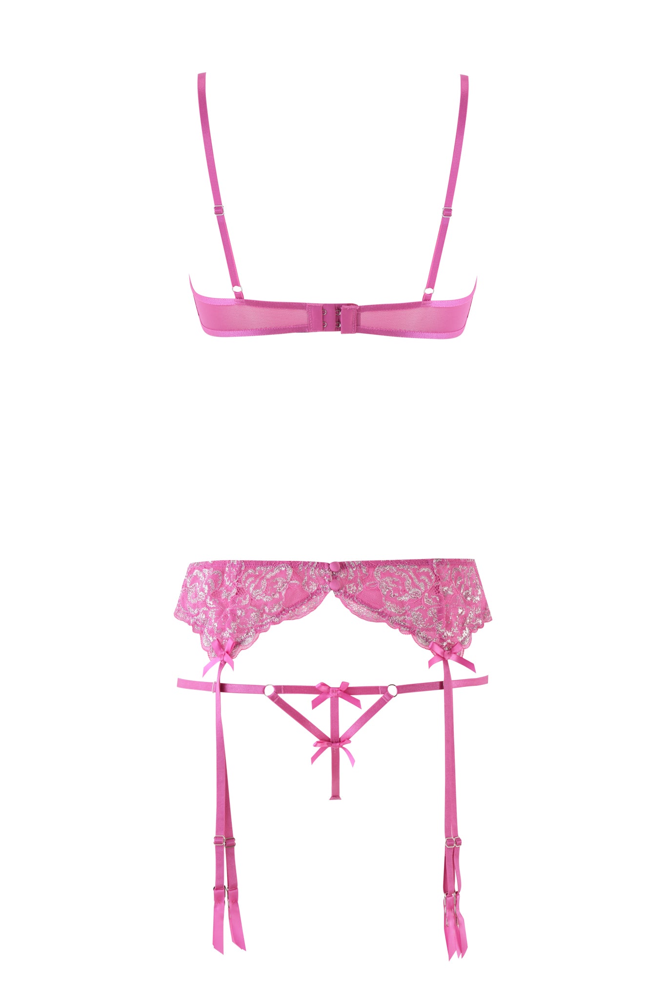 The I.AM.GIA RAINE 3 PIECE METALLIC SET - PINK is Y2K-inspired, featuring a pink hue with stretch lace details. It includes a bra with adjustable straps and clasp, plus a garter belt adorned with ribbon accents and intricate lace patterns on a crisp white background.