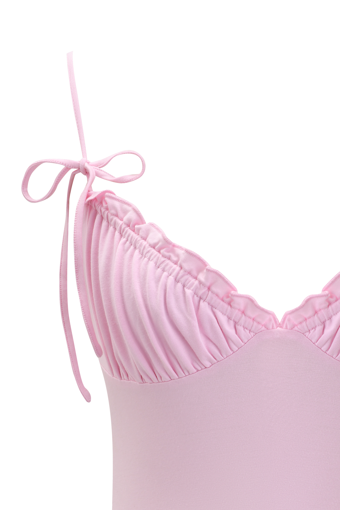 Close-up of the I.AM.GIA MELANIE CAMI in pink, showcasing a ruched bamboo bust and an adjustable bow on the left shoulder strap, set against a plain background.