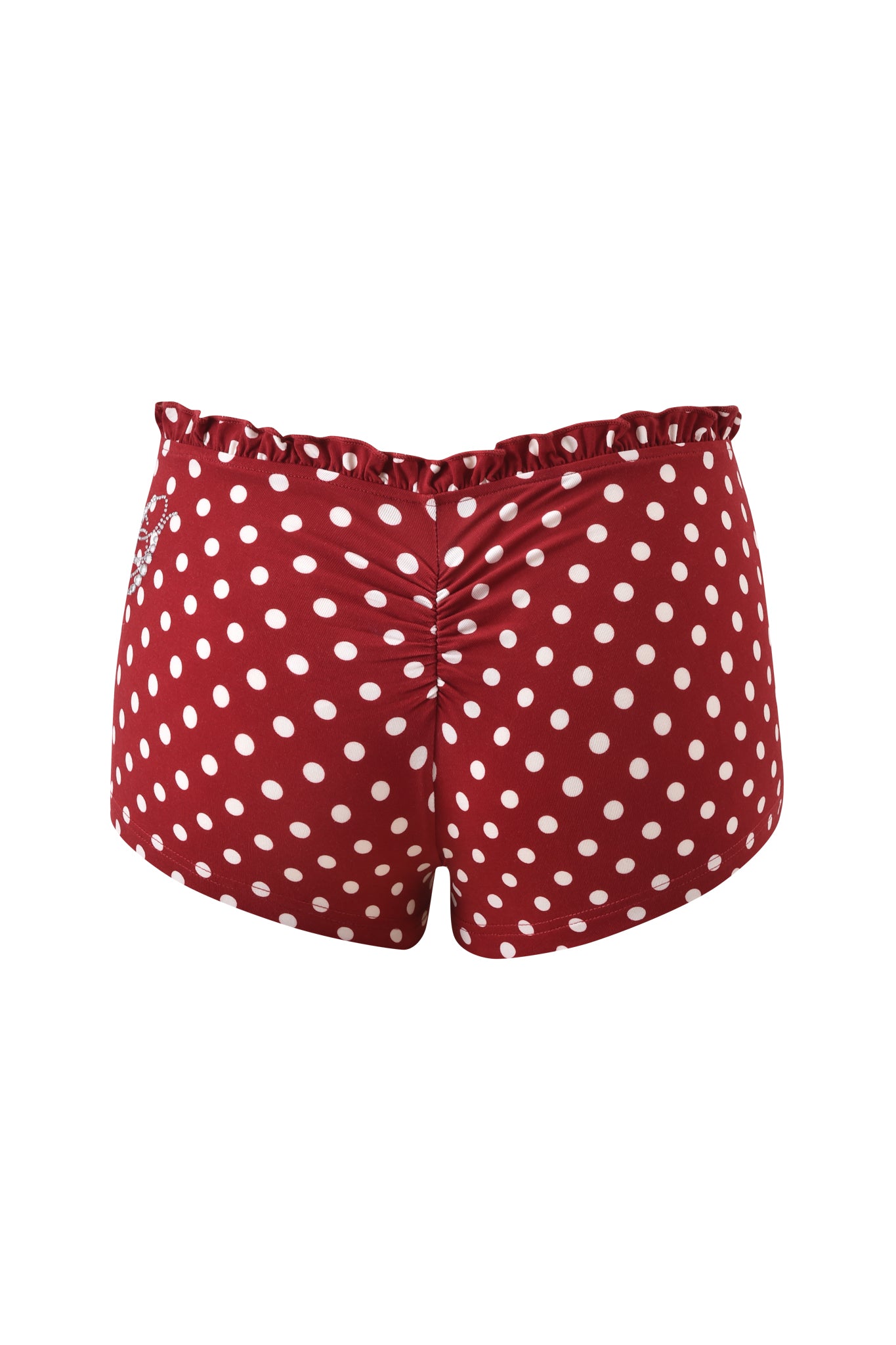 The I.AM.GIA MELANIE SHORT - RED POLKA DOT features a ruffled waistband, back-center ruching, and playful red and white polka dots—making it a perfect, standout piece for your summer wardrobe. Displayed on a plain white background.
