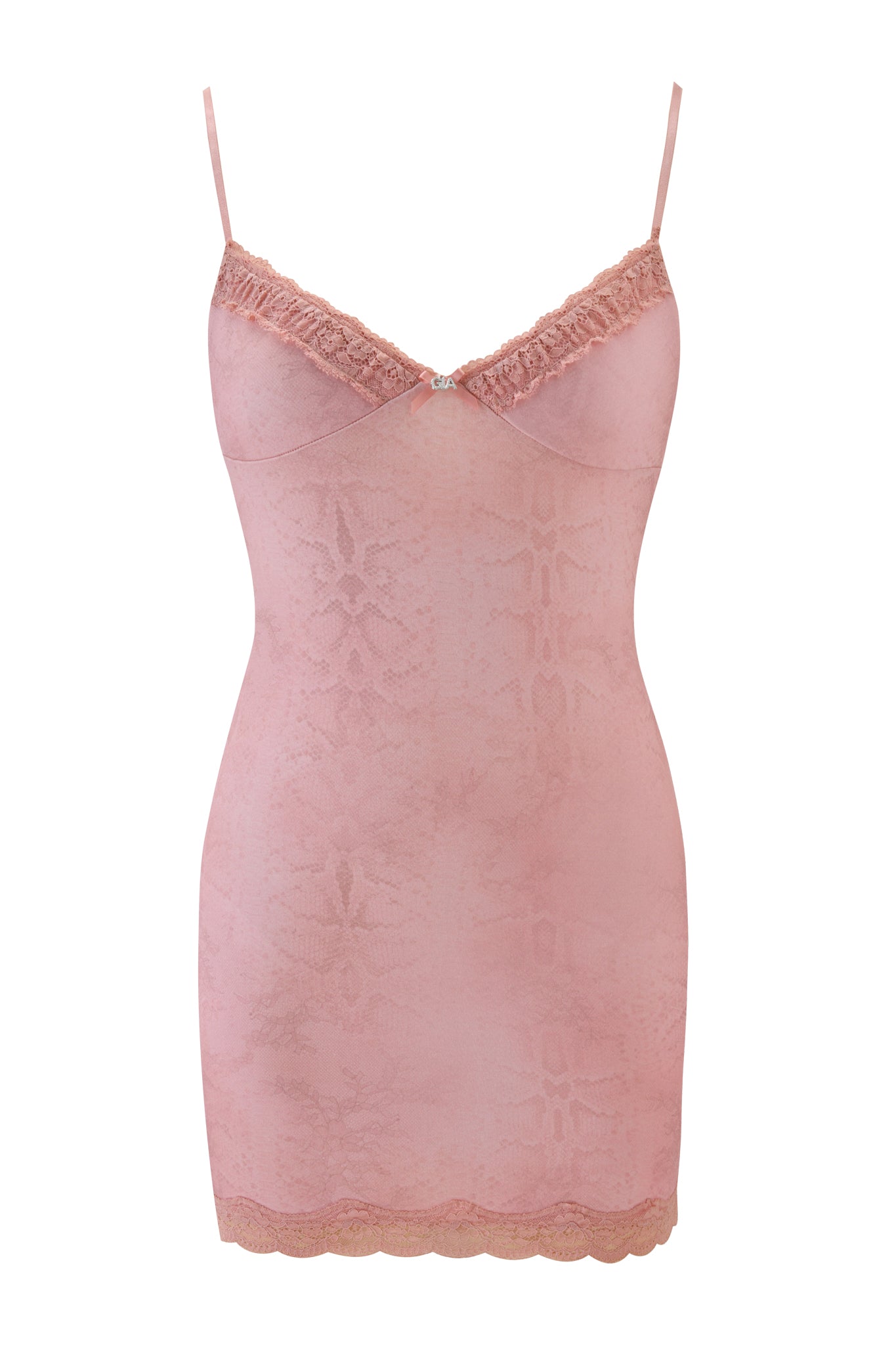 The I.AM.GIA Kisa Slip Dress in Peach Serpentine features thin spaghetti straps, lace trim, a center neckline bow, and a subtle floral pattern throughout.