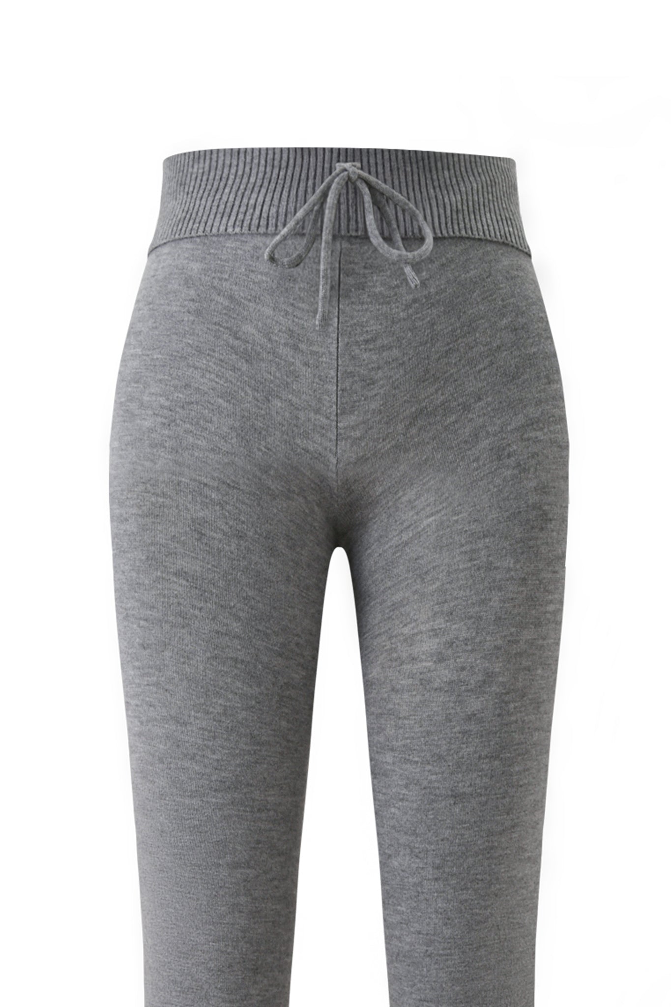 The JESSA PANT - GREY by I.AM.GIA features a ribbed, high-waisted waistband and front drawstring. These charcoal grey knit flared pants are displayed against a white background.