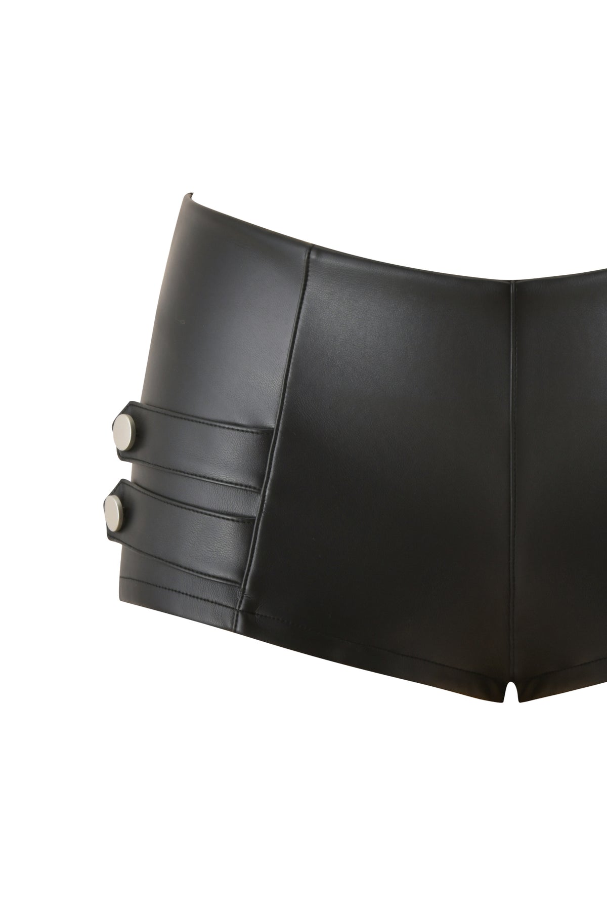 The AKASHA HARDWARE HOT SHORT - BLACK by I.AM.GIA features a bodycon fit in black faux leather, adorned with two decorative side straps and metallic buttons on the left hip, displayed against a white background.