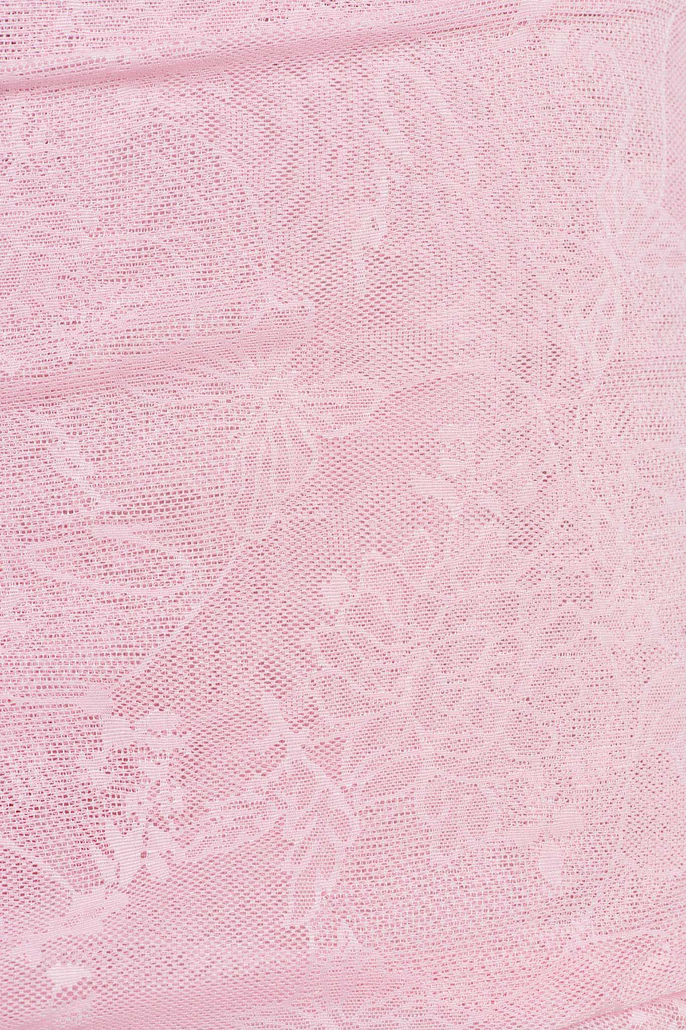 A close-up image of the NALLIAH PANT in pink lace from I.AM.GIA, showcasing delicate lace fabric adorned with an intricate floral pattern. The design features various flower and leaf motifs, creating a soft and elegant texture.