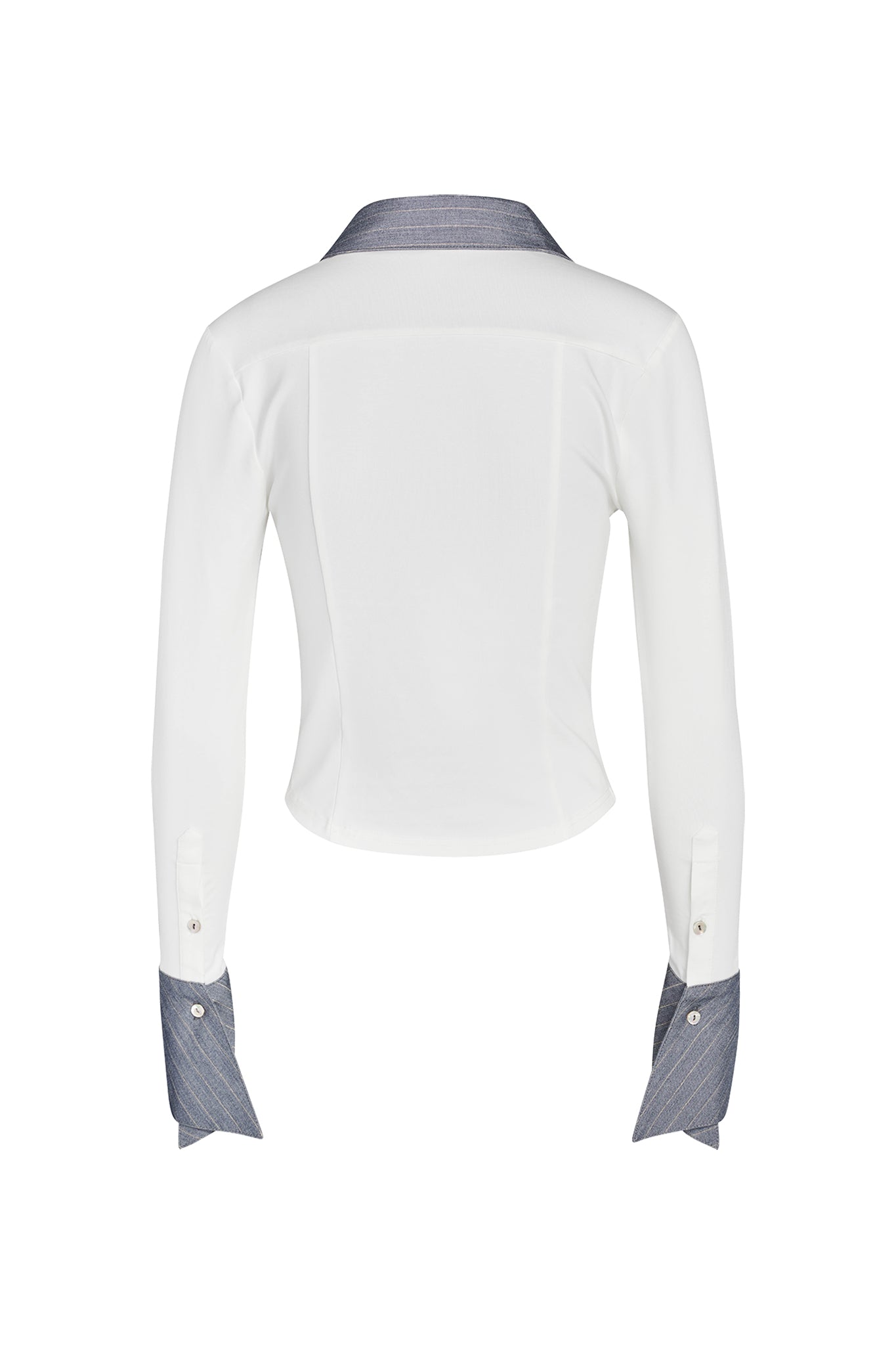 Back view of the stylish SHARAH TOP - WHITE by I.AM.GIA, featuring a crisp white body with a contrasting dark collar and dark cuffs adorned with button details. This long-sleeve blouse has a fitted silhouette, offering a polished and modern look that is perfect for both formal and casual settings.