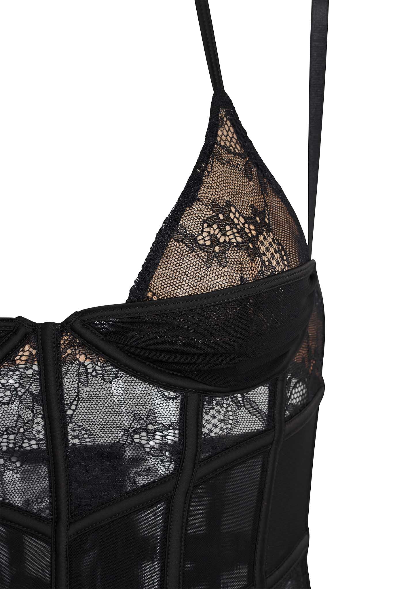 Close-up of the I.AM.GIA VERUCA SET - BLACK, a black lace lingerie top with thin shoulder straps. The semi-sheer fabric showcases delicate floral lace patterns, and the structured seams provide a corset-like appearance.