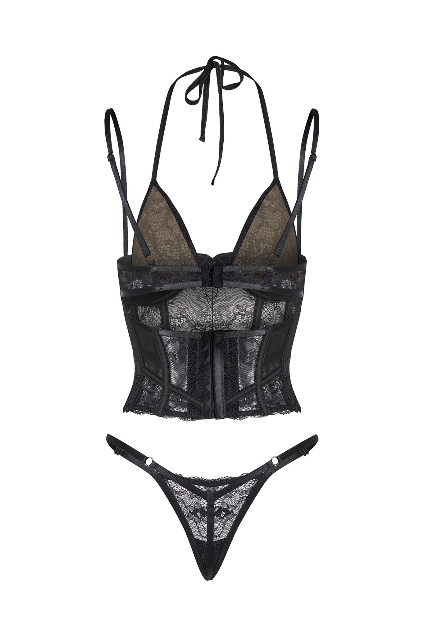 The VERUCA SET - BLACK by I.AM.GIA is a black lace lingerie set featuring a halter-neck bralette with underwire cups, intricate floral lace patterns, and adjustable shoulder straps. It includes a matching pair of lace thong panties adorned with delicate floral lace detailing.