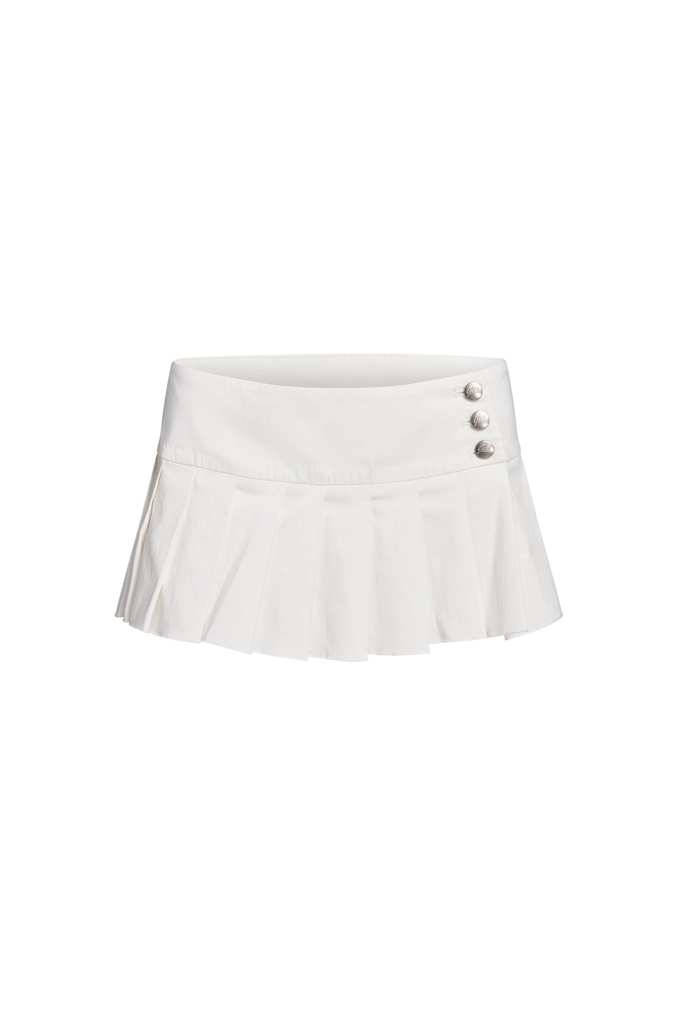 The REMINI SKORT - WHITE from I.AM.GIA is a white, pleated micro mini skort featuring a low-rise waist and three silver buttons on the right side. Its simple, elegant design makes it perfect for both casual and semi-formal occasions.